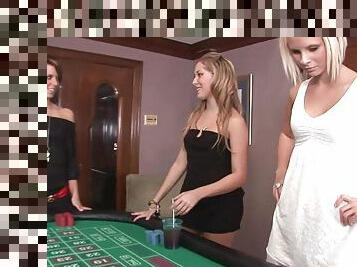 Three sizzling hot girls play in roulette and strip