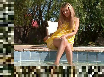 Faye Barts enjoys touching her pussy on the poolside