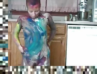 She covers her body in paint