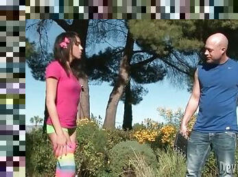 Skinny teen in rainbow socks gobbles cock outdoors