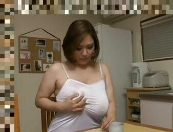 Japanese mom Reiko Yumeno enjoys playing with her huge boobs and vag
