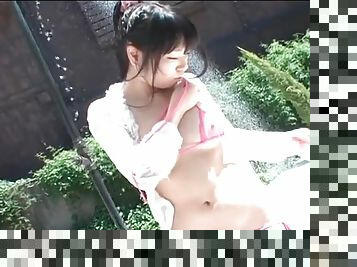 Sheer pink bikini on wet Japanese teen