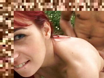 Redhead with big tits gets fucked doggy style