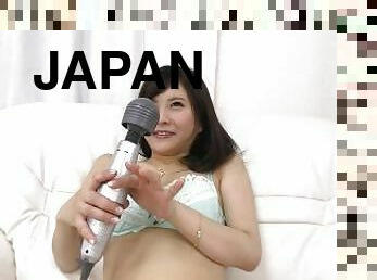 Japanese Mio Arisaka masturbates with a vibrator and a sex toy uncensored.