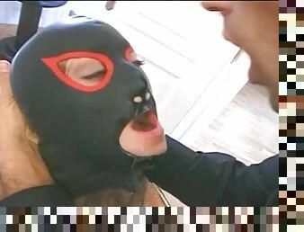 Sexy girl in mask and fishents getting fucked in the ass