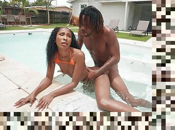 Aroused ebony goes very loud during outdoor pool porno with her new BF