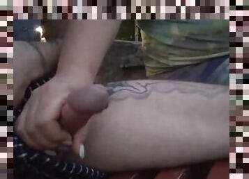 jerking off my cock near the house on a bench