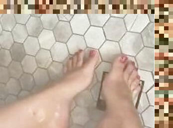 Enjoying a hot shower while off my new pedi