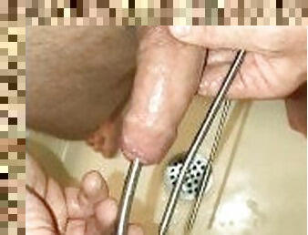 Intense Pissing With Urethral Sounding Rods Inserted