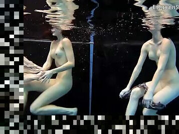 Teens swim and strip nude in underwater video