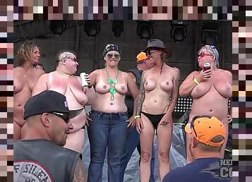 Biker babes topless on stage dancing for the guys
