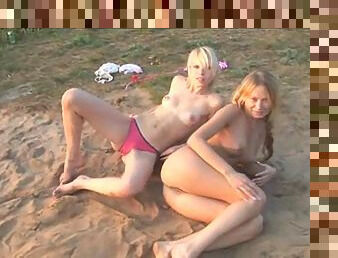 Two hot lesbians on the beach
