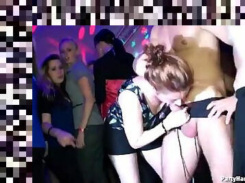 Dildo sucking girl at club covered in fake cum