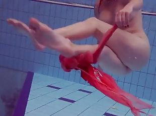 Big tits, big ass tattooed Katrin Privesem underwater
