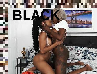 Black lesbians Kira Noir and Baby Gemini make love in bed