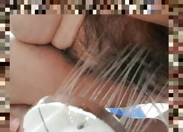 Peeing and washing my vagina, the water dripping on my clitoris makes me very hot