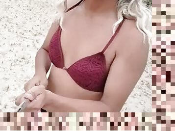 Sweet hot shemale in miniskirt, bra and red heels walks sexy in public