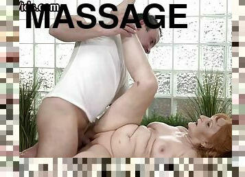 Ginger oiled GILF pussy rammed by masseuse on massage table