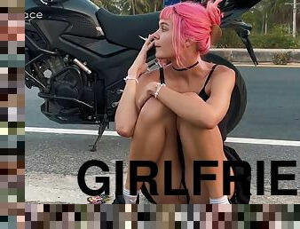 Girlfriend on motorbike peeing on the side of the road