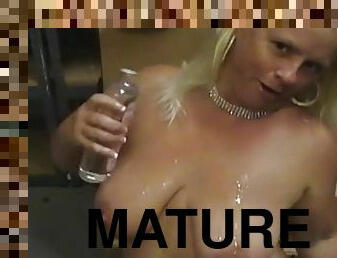 Fat mature Taylor Foxe gets naked and plays with her juicy cunt