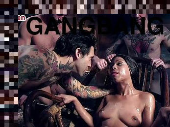 Little bitch gangbanged and showered with cumshot in a bukakke session