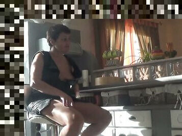 I love watching nasty mature woman masturbate in the kitchen