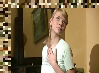Young horny babe teasing on couch