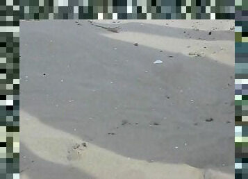 Pissing on the beach