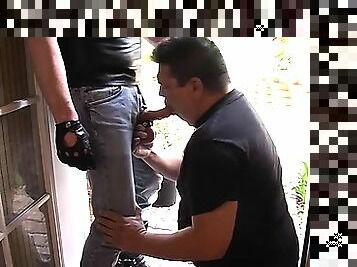 Chubby gay dude Lycan drops to his knees and sucks the masked man's big dick