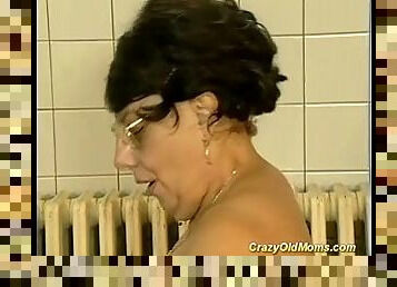 Brunette busty old mom gets big cock fucked by younger guy