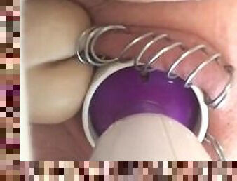 Horny babe toys her pierced pussy