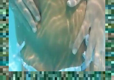 Naughty schoolmate stripping in the pool