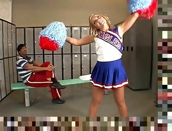Adorable blonde teen cheerleader talking with her teacher