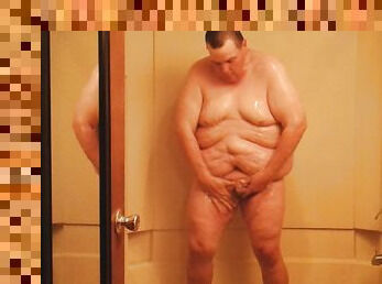 Nude in shower on camera